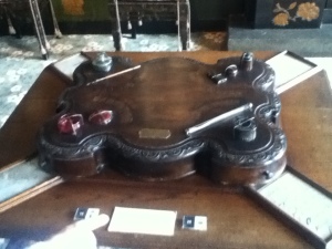 A writing desk he had made, with letters from and the inkwells of his writer pals.